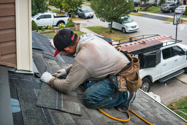 Professional Roofing technician working in Foster, WV